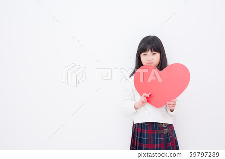 Elementary school girl with heart 59797289