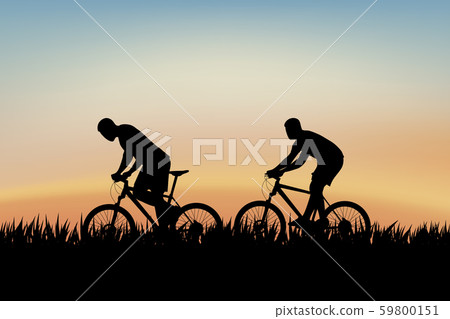 cyclists on grass cyclists on grass 59800151