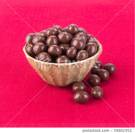 Chocolate ball or chocolate balls in bowl on 59802952