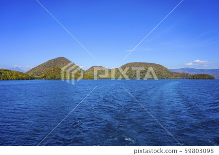 Lake Toya Nakajima (view from pleasure boat) Lake Toya Nakajima (view from pleasure boat) 59803098