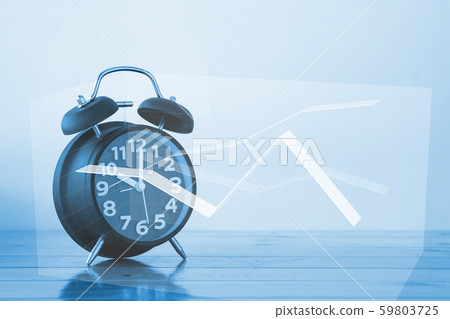 Black color vintage alarm clock on table with Black color vintage alarm clock on table with 59803725