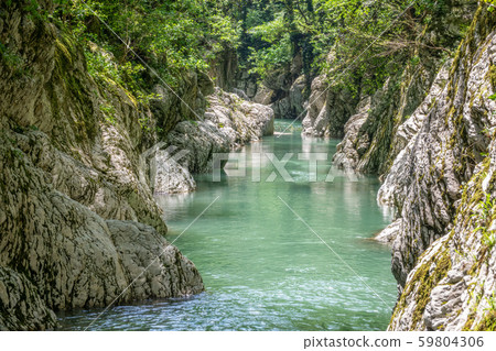 Mountain river in the stone gorge. Mountain river in the stone gorge. 59804306