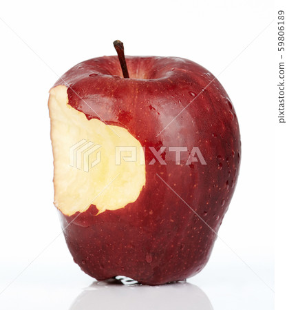 One bite on red apple One bite on red apple 59806189