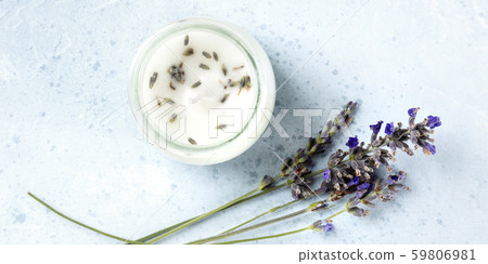 A lavender scented candle panoramic shot, with lavender flowers and copyspace. Zero-waste Christmas A lavender scented candle panoramic shot, with lavender flowers and copyspace. Zero-waste Christmas 59806981
