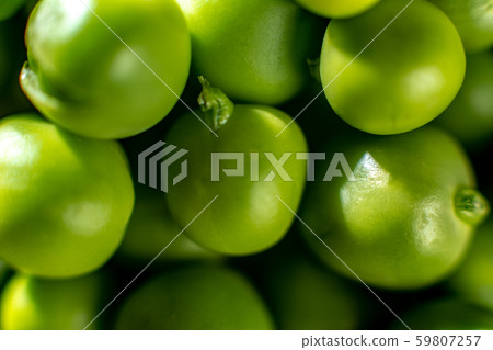 Green fresh peas, close-up texture. 59807257