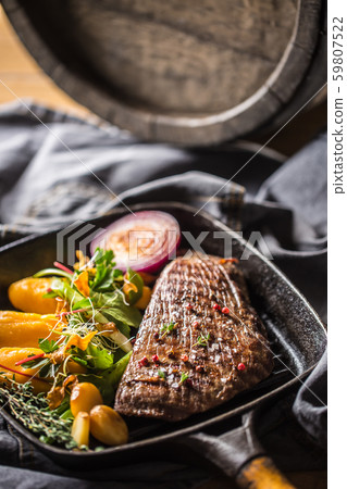 Beef flank steak in grill pan with batata puree Beef flank steak in grill pan with batata puree 59807522