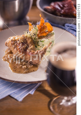 Rabbit leg with mashes potatoes and decoration on 59807553