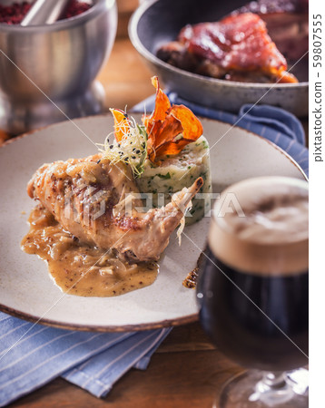 Rabbit leg with mashes potatoes and decoration on 59807555