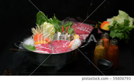Close-up view of shabu shabu in hot pot with black 59808793