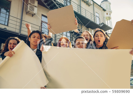 Young people protesting of women rights and equality on the street Young people protesting of women rights and equality on the street 59809690