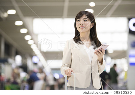 Airport business trip woman Airport business trip woman 59810520