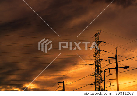 Silhouette high voltage electric pylon and sunset. 59811268