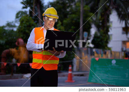 Handsome Persian man construction worker at the construction sit 59811963