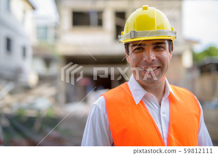Handsome Persian man construction worker at the construction sit 59812111
