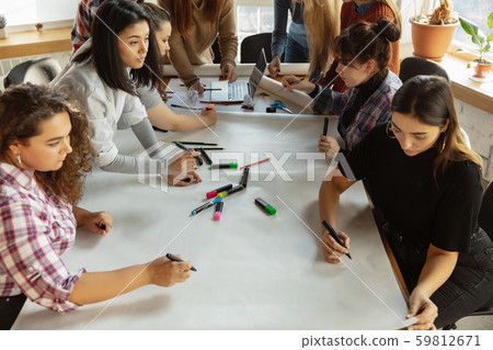 Young people discussing about women rights and equality at the office 59812671