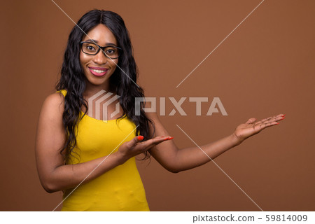 Portrait Of Beautiful Young African Woman Portrait Of Beautiful Young African Woman 59814009