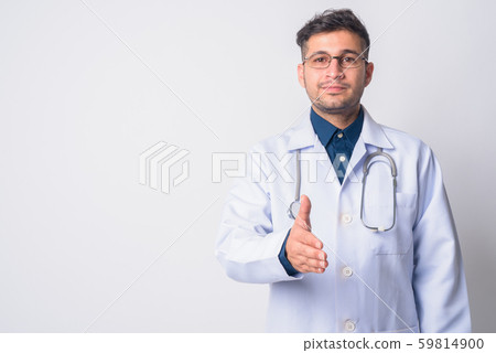 Portrait of young Persian man doctor giving handshake 59814900