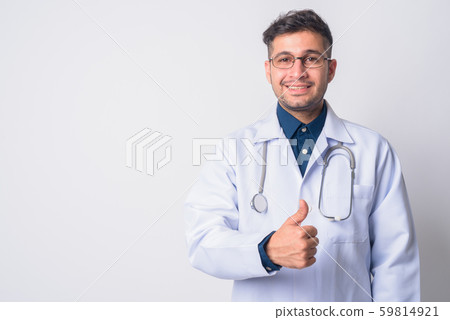Portrait of happy Persian man doctor giving thumbs up 59814921