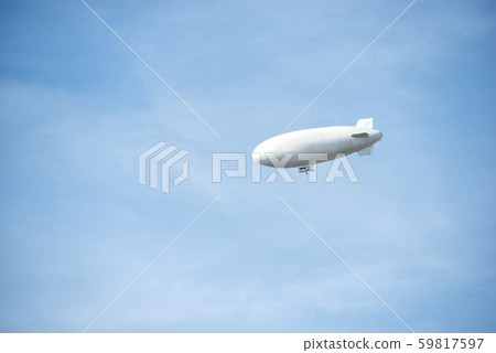 zeppelin on the blue sky in summer time 59817597