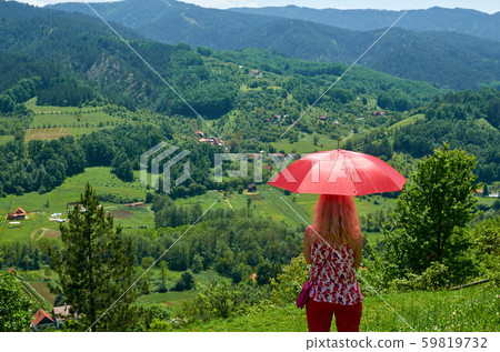 Woman enjoying landscape Woman enjoying landscape 59819732