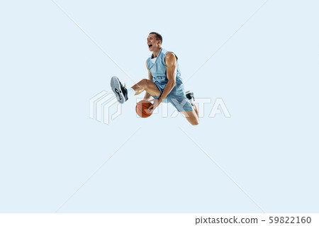 Young caucasian basketball player against white studio background 59822160