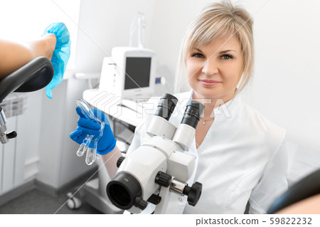 A gynecologist is examined by a patient who is 59822232