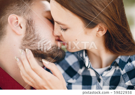 Beautiful couple spend time in a summer park 59822938