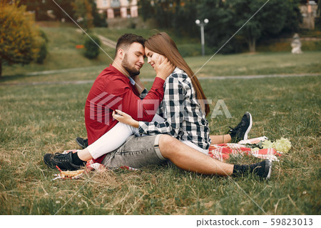 Beautiful couple spend time in a summer park 59823013