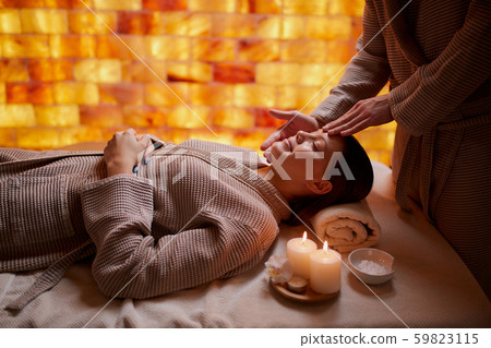 calm beautiful woman in massage spa salon calm beautiful woman in massage spa salon 59823115