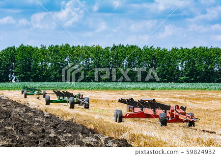 Agricultural machinery on the field 59824932