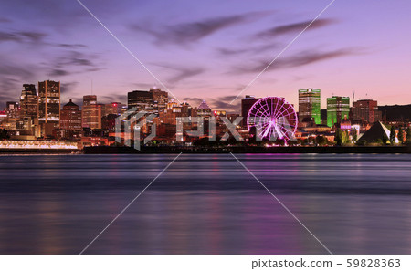 Montreal skyline illuminated at dusk reflected in Saint Lawrence River, Quebec, Canada Montreal skyline illuminated at dusk reflected in Saint Lawrence River, Quebec, Canada 59828363