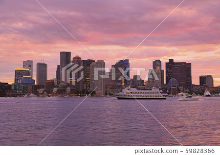 Boston skyline at sunset wit cruise boat sailing on the foreground, USA Boston skyline at sunset wit cruise boat sailing on the foreground, USA 59828366