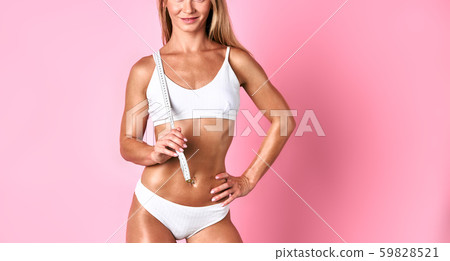 Charming bodybuilder over pink wall 59828521