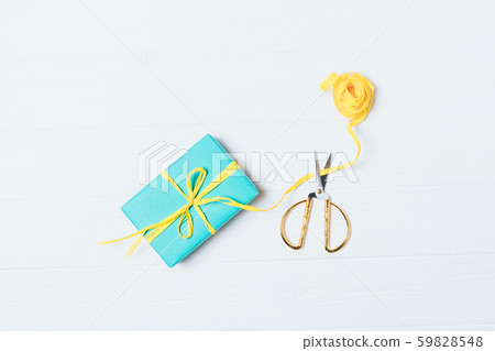 Top view of gift box in packaging process Top view of gift box in packaging process 59828548