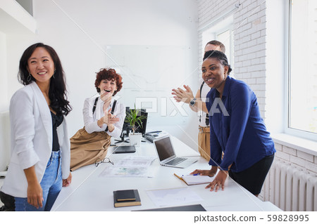 business and education concept. young leaders applause in office business and education concept. young leaders applause in office 59828995