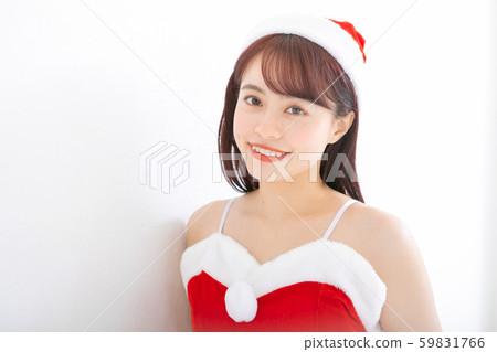 A woman in Santa costume 59831766
