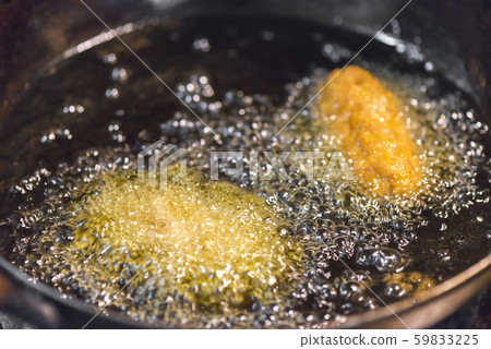 Scene of cooking fried food with oil 59833225