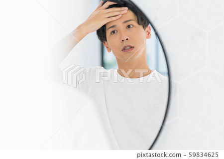Young man in the toilet Young man in the toilet 59834625