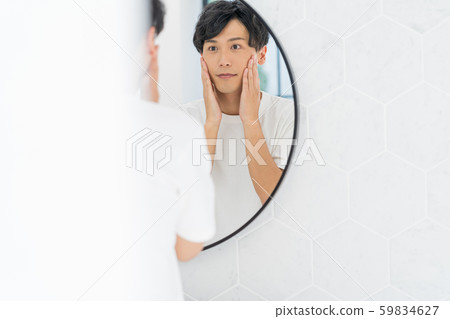 Young man in the toilet Young man in the toilet 59834627