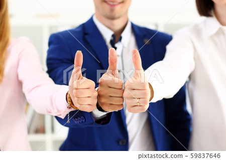 Group of people show OK or approval with thumb up Group of people show OK or approval with thumb up 59837646