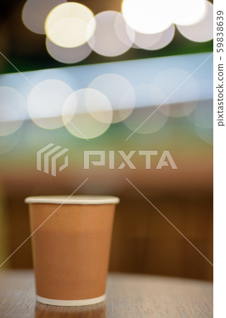 Hot Coffee In Paper Cup Placed On Wooden Table Hot Coffee In Paper Cup Placed On Wooden Table 59838639
