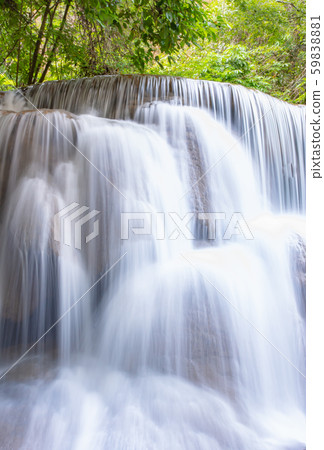 Waterfall flowing from the mountains at Huay Mae khamin waterfall National Park ,Kanchana buri. Waterfall flowing from the mountains at Huay Mae khamin waterfall National Park ,Kanchana buri. 59838881
