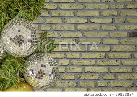 Glass ball ornaments on a Christmas tree Background brick with clipping path. Glass ball ornaments on a Christmas tree Background brick with clipping path. 59838884