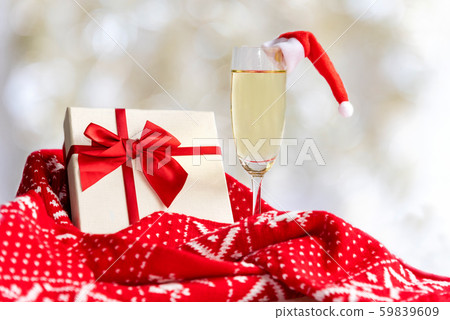 Merry Christmas. Red gift box with red sweater Merry Christmas. Red gift box with red sweater 59839609