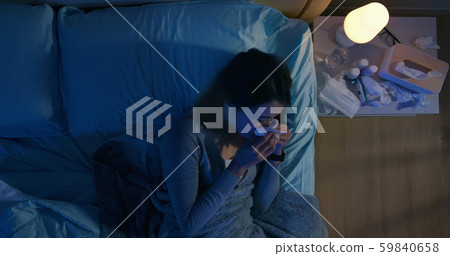asian woman sneezed on bed 59840658