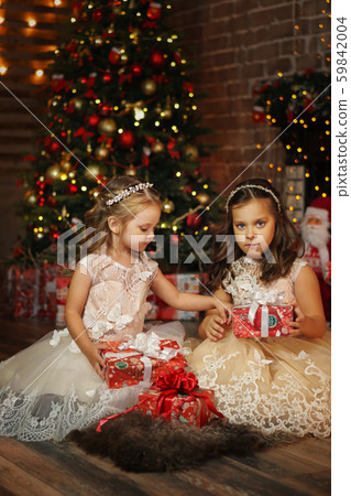 Little sisters on christmas eve Little sisters on christmas eve 59842004