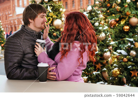 Lovers walk at the christmas market 59842644