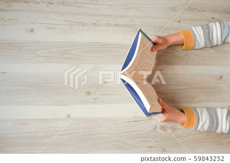 Reading person close-up and copy space Reading person close-up and copy space 59843252