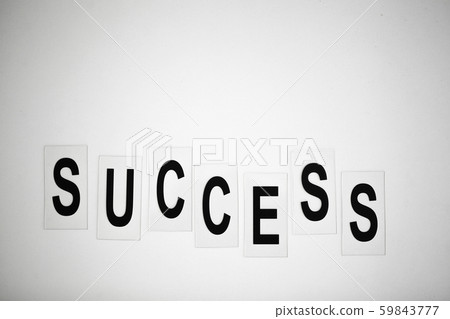 Success word written on white table. Copy space 59843777