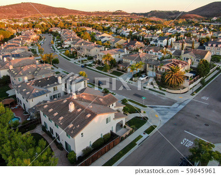 Aerial view of residential modern subdivision during sunset Aerial view of residential modern subdivision during sunset 59845961
